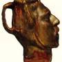 1889_jug_in_the_form_of_a_head_self-portrait.jpg